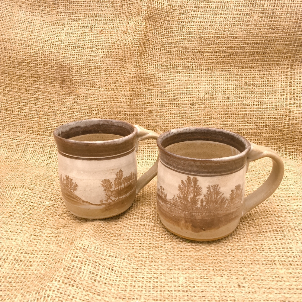 Rustic Pottery Mugs Brown and Cream with a delightful scenic decoration